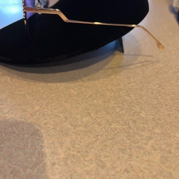 Cleo Nicci sunglasses with pink tint. - Picture 5 of 8